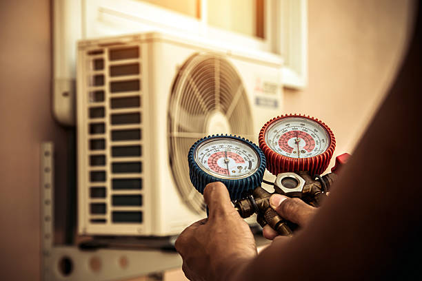 Professional Hvac technician working in Camp Hill, AL